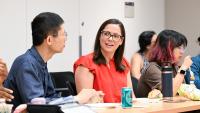 Attendees talk during a SHARP training during a break